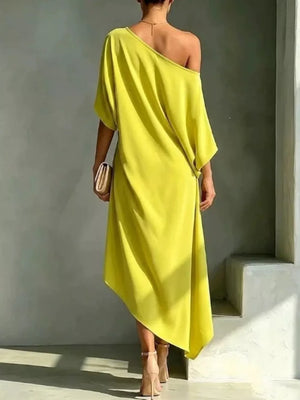 Yellow one-shoulder midi dress with asymmetric hem and draped detail
