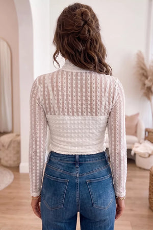 White blouse featuring mesh and striped