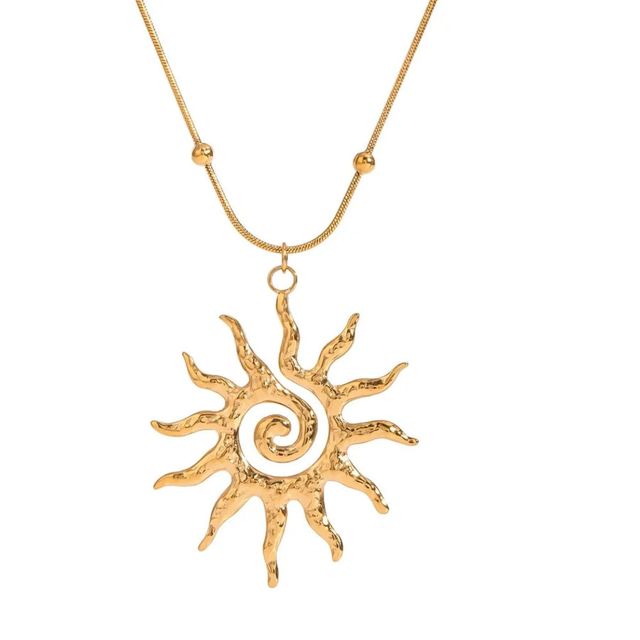 necklace featuring sun motif in gold with lace texture