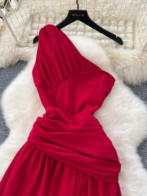 Red one-shoulder maxi dress with ruched detail and floral accents.