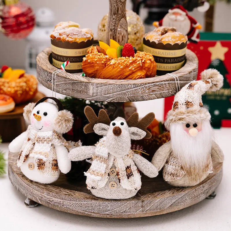 Festive Trio Knitted Ornament Set: snowman, reindeer, and Santa plush figures with cozy scarves and hats.
