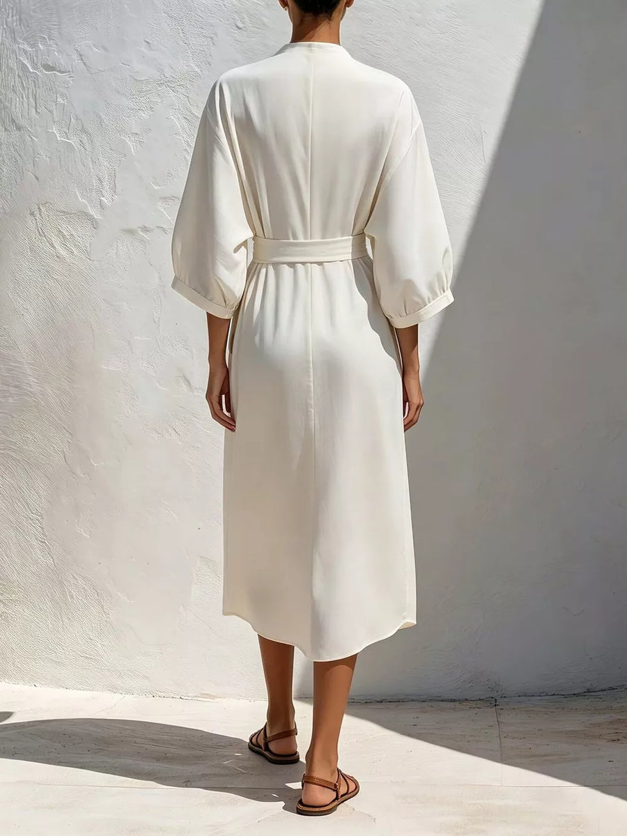 100% polyester Care instructions: Machine wash cold midi dress in Navy with relaxed silhouette