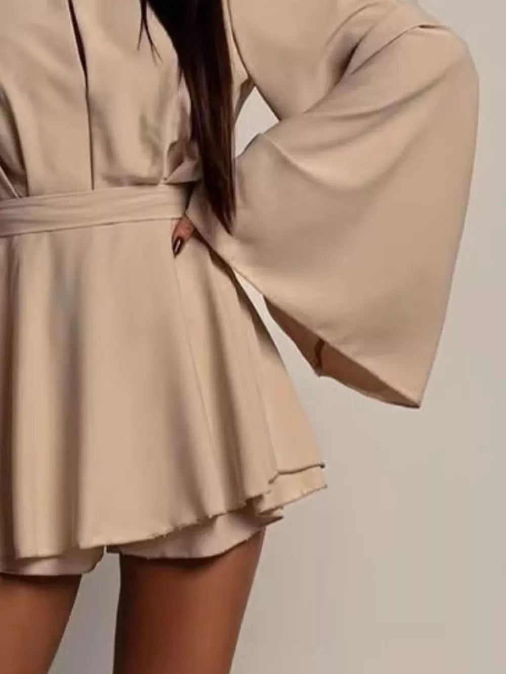 white mini dress with lined and flare sleeve