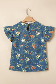 Denim floral blouse with short ruffled sleeves and keyhole back detail.