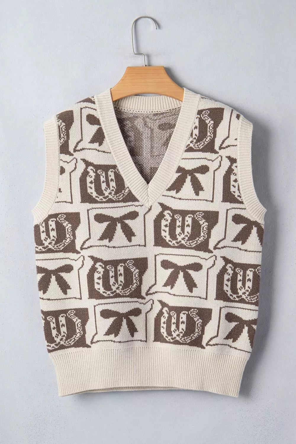 sweater vest featuring Western Horseshoe Bow Pattern in brown with 52% viscose, 26% polyester, 22% polyamide Care