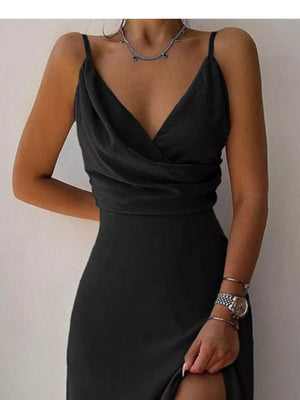 Black draped V-neck maxi dress with spaghetti straps and a side slit.