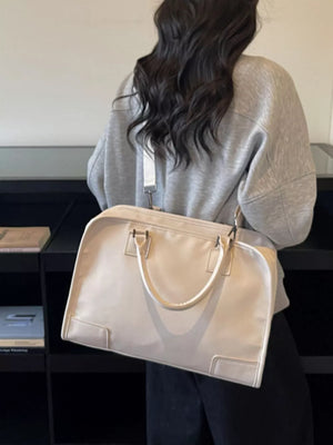 Cream pu leather travel bag with top handles and adjustable strap