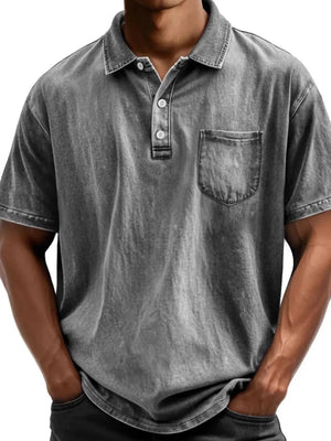 Gray acid wash relaxed fit polo shirt with chest pocket and button placket.