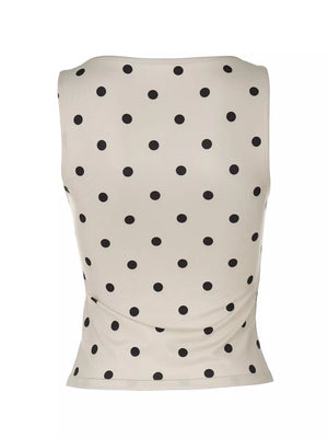 Chic ruffled polka dot tank top in khaki with a draped detail.