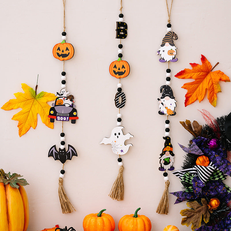 Halloween Charm Trio Garland with pumpkins, ghosts, gnomes, and bats in multicolor.
