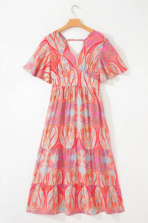 Paisley print v-neck short sleeve tiered boho maxi dress in burnt coral and pink.