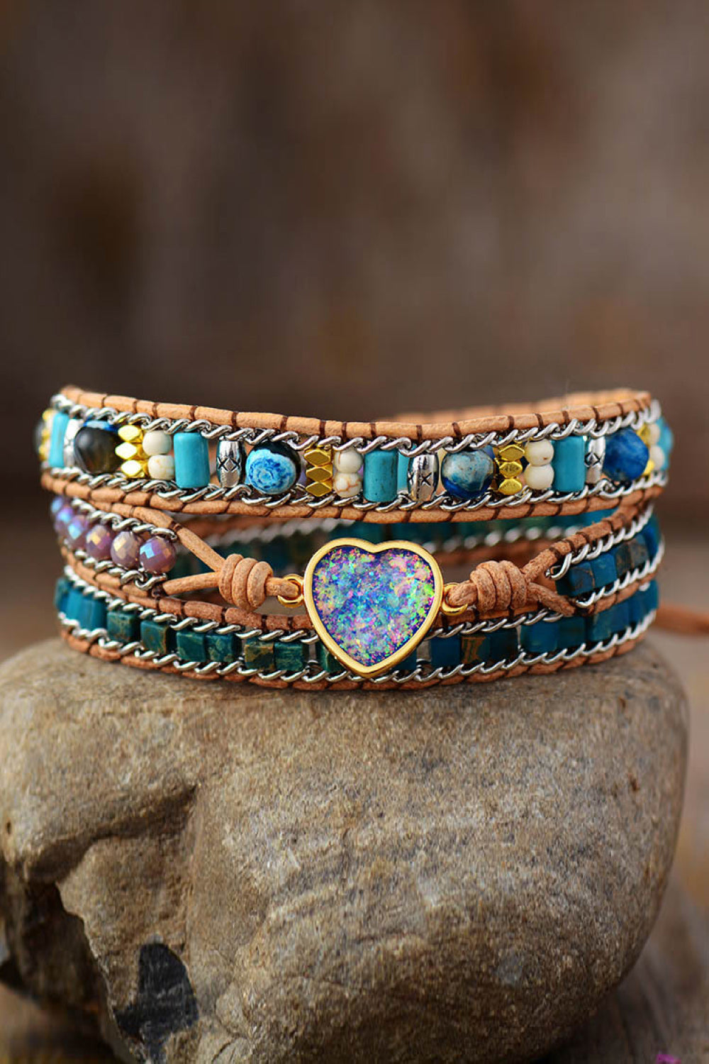 Bohemian wrap bracelet with teal beads, chain, and heart detail.