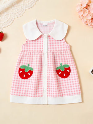 Pink gingham toddler dress with white collar, button front, and strawberry appliqué pockets.
