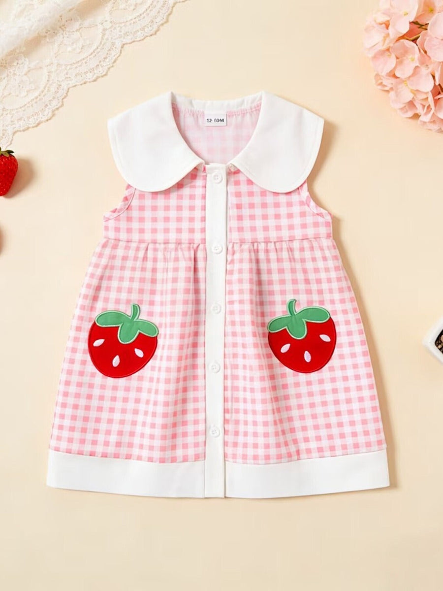 Pink gingham toddler dress with white collar, button front, and strawberry appliqué pockets.