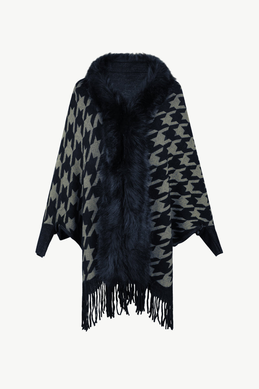 Houndstooth faux fur collar poncho with fringe detail in beige and black.