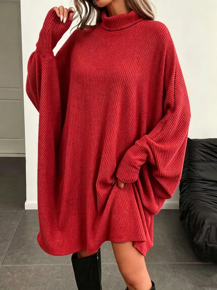 Black sweater dress with pullover and ribbed knit