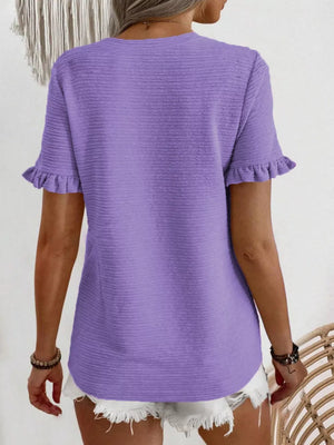 Purple textured t-shirt with ruffle short sleeves and a crew neck.