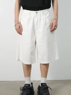 White pleated Bermuda shorts with a buttoned waist and relaxed fit.