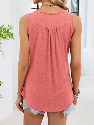 Pink ruched tank top with button detail and curved hem.