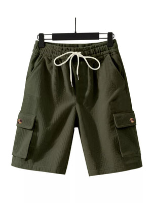 Military green textured drawstring cargo shorts with button flap pockets.