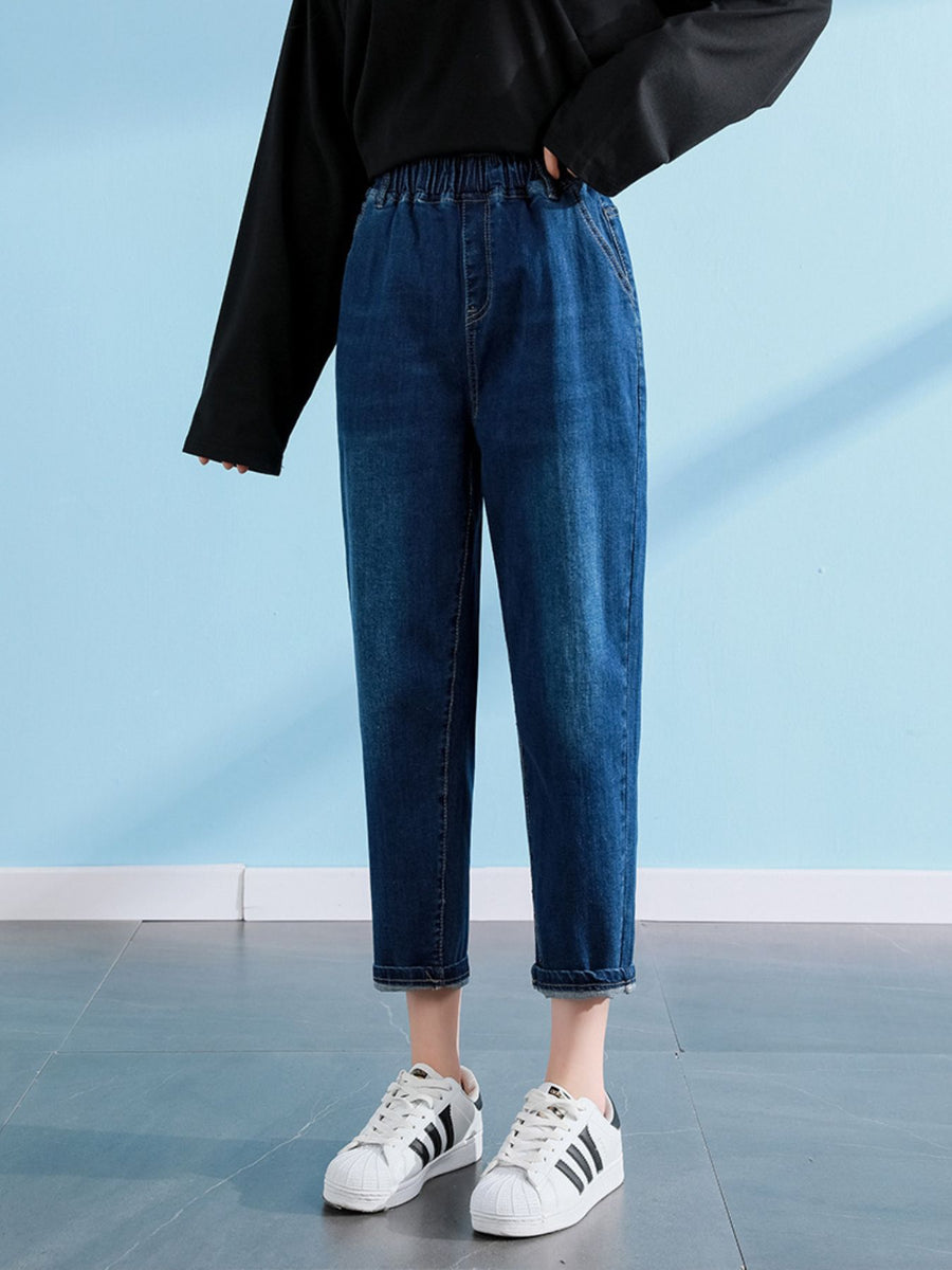 medium wash denim jeans with ankle-length and elastic