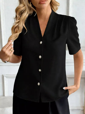 Black V-neck button-down shirt with pearl buttons and puff sleeves.