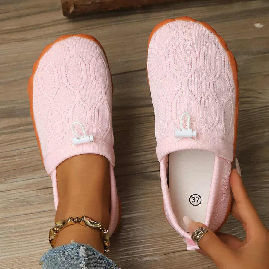 light pink flats with drawstring and geometric