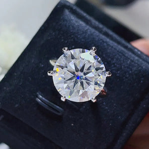 Solitaire engagement ring with large round diamond in white 925 silver setting.