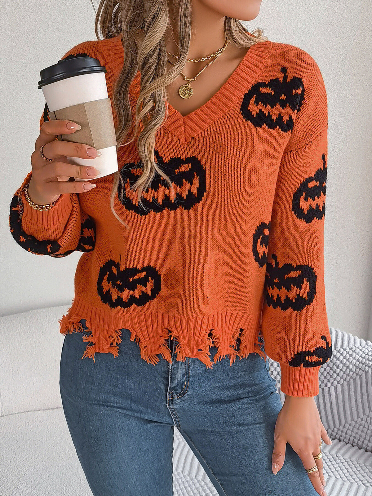 Pumpkin Distressed Hem Sweater in Black