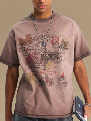 Mocha vintage wash graphic tee with distressed graffiti print and crew neck.