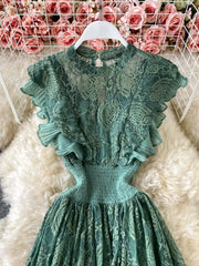 Green lace maxi dress with ruffled sleeves and smocked waist