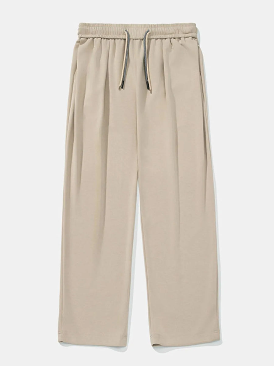 Khaki oversized drape-front lounge trousers with drawstring waist and wide leg