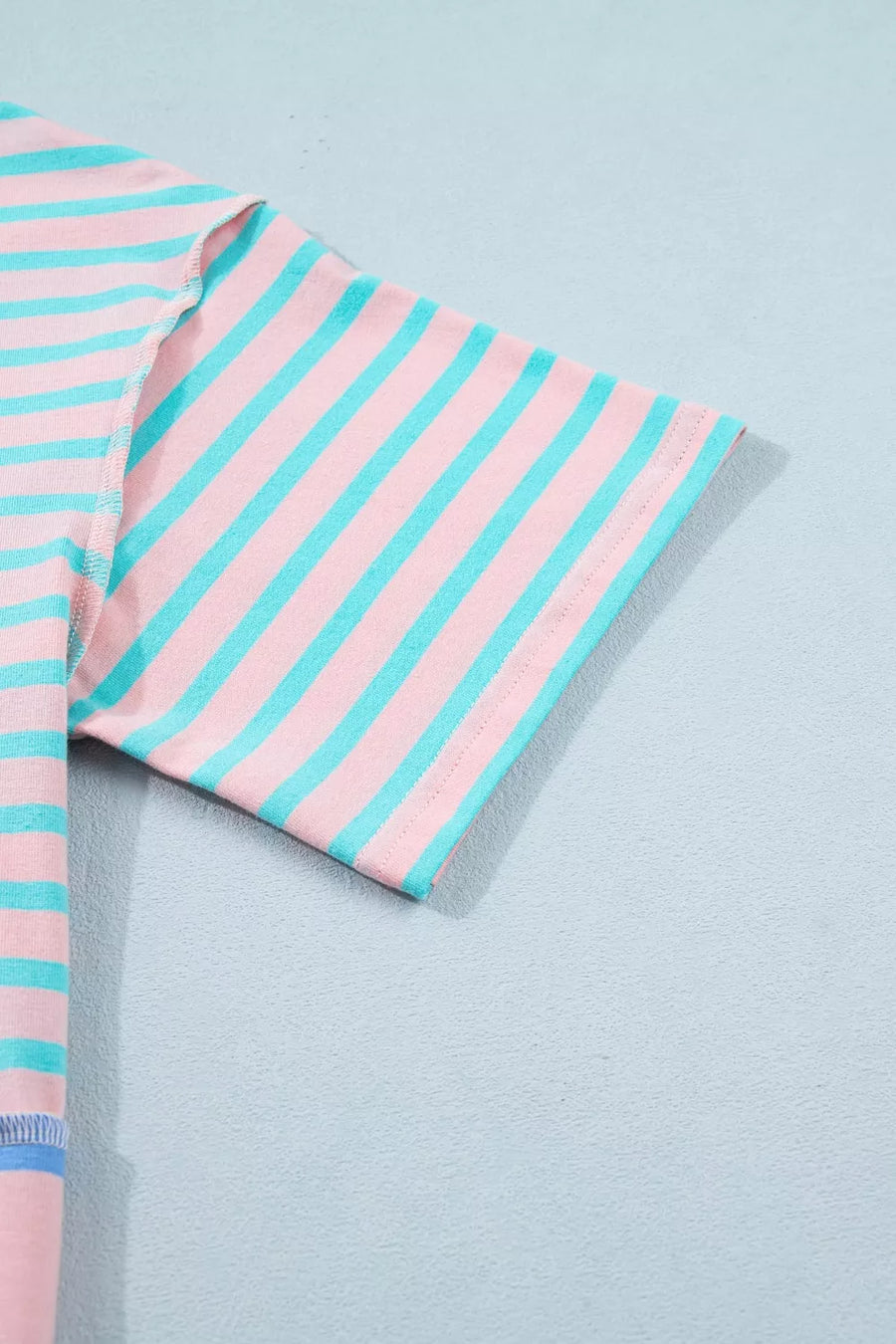 Pink and blue striped t-shirt with short sleeves