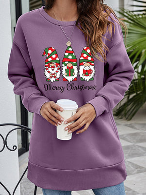 Purple tunic sweatshirt with Christmas gnomes graphic and Merry Christmas text.