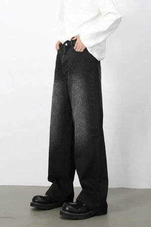 Faded dark wide-leg denim jeans with a relaxed fit.