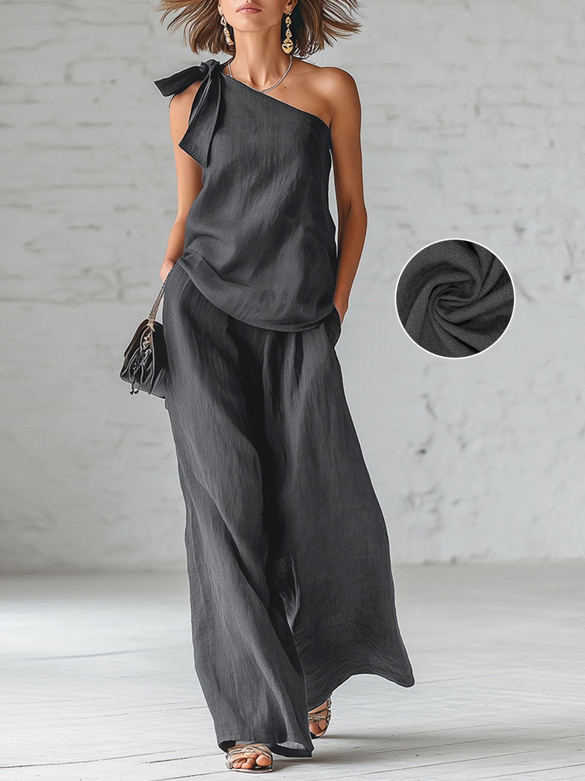 two-piece set in charcoal featuring pocketed and relaxed fit