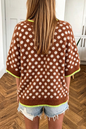 white pullover sweater featuring stretchy and polka dot