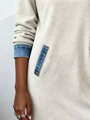 light blue sweatshirt dress featuring pocketed and patchwork