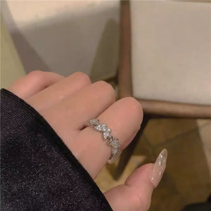 clear ring featuring open design and butterfly