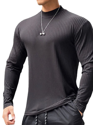 Black ribbed mock neck muscle fit long sleeve shirt with vertical texture.