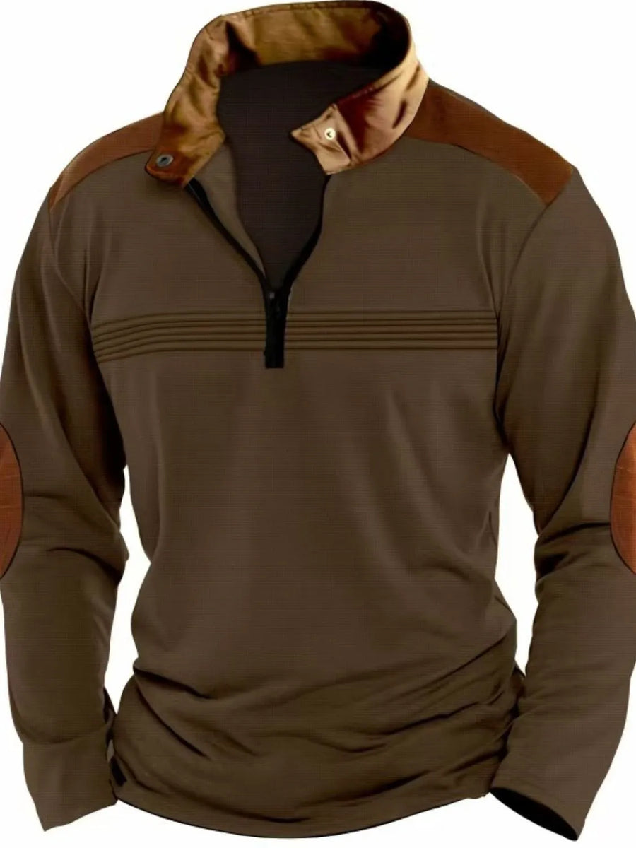 Contrast-panel quarter-zip pullover in Coffee Brown with horizontal chest stripes and elbow patches.