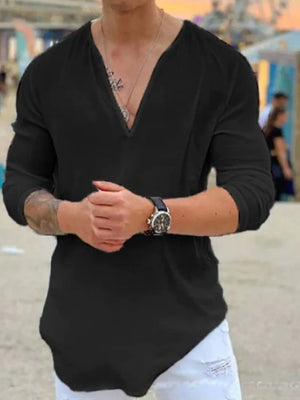 Black linen relaxed fit top with deep V-neck and long sleeves.