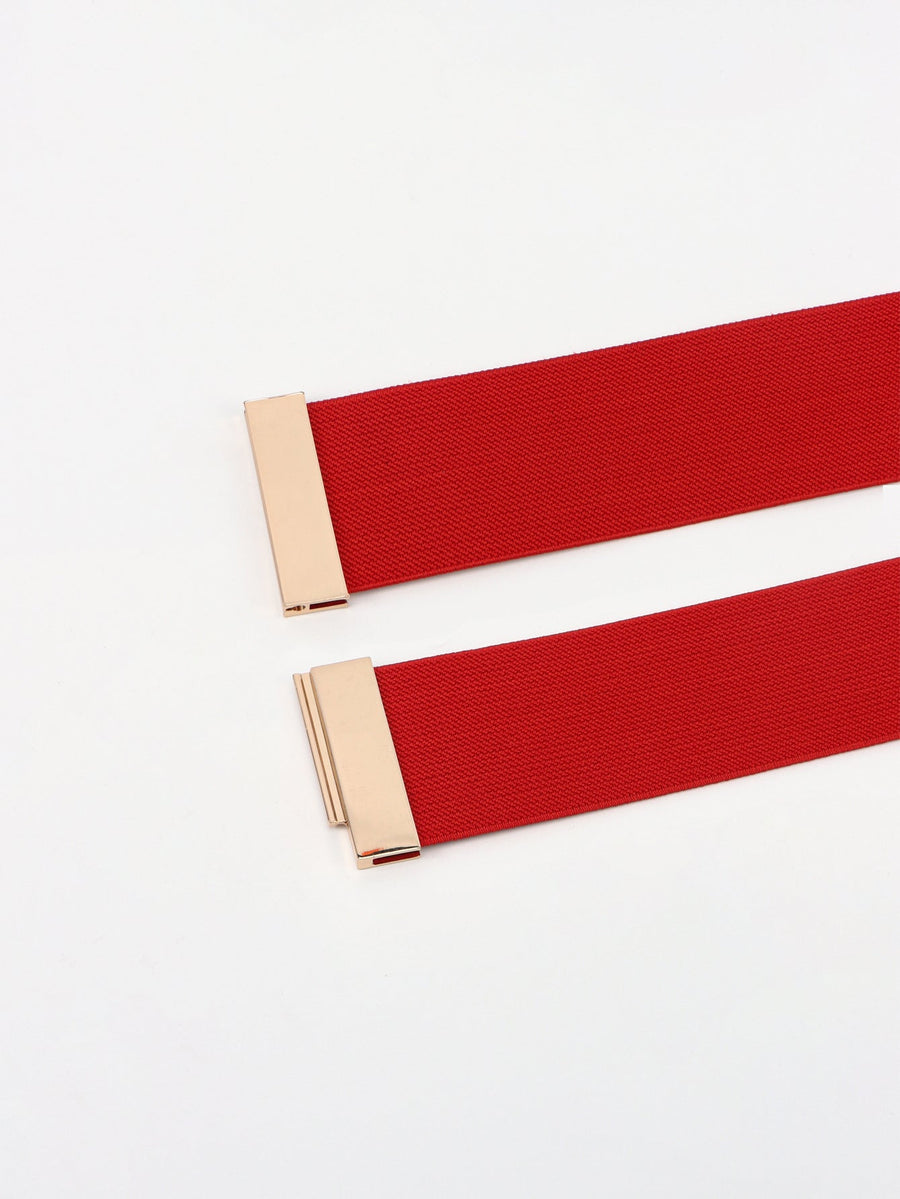 Wide elastic belt in Deep Red with gold clasp detail.