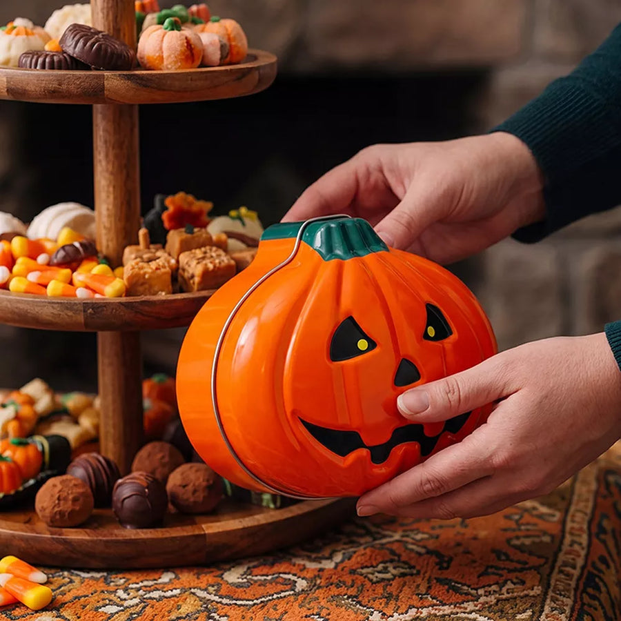 storage box in black with jack-o'-lantern motif and pumpkin shape