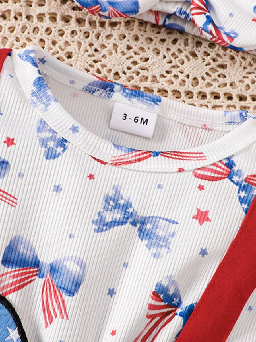 Baby cotton set with patriotic bow and star print, red straps.