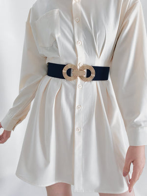 Interlocking Circle Stretch Belt in black with gold interlocking buckle detail.