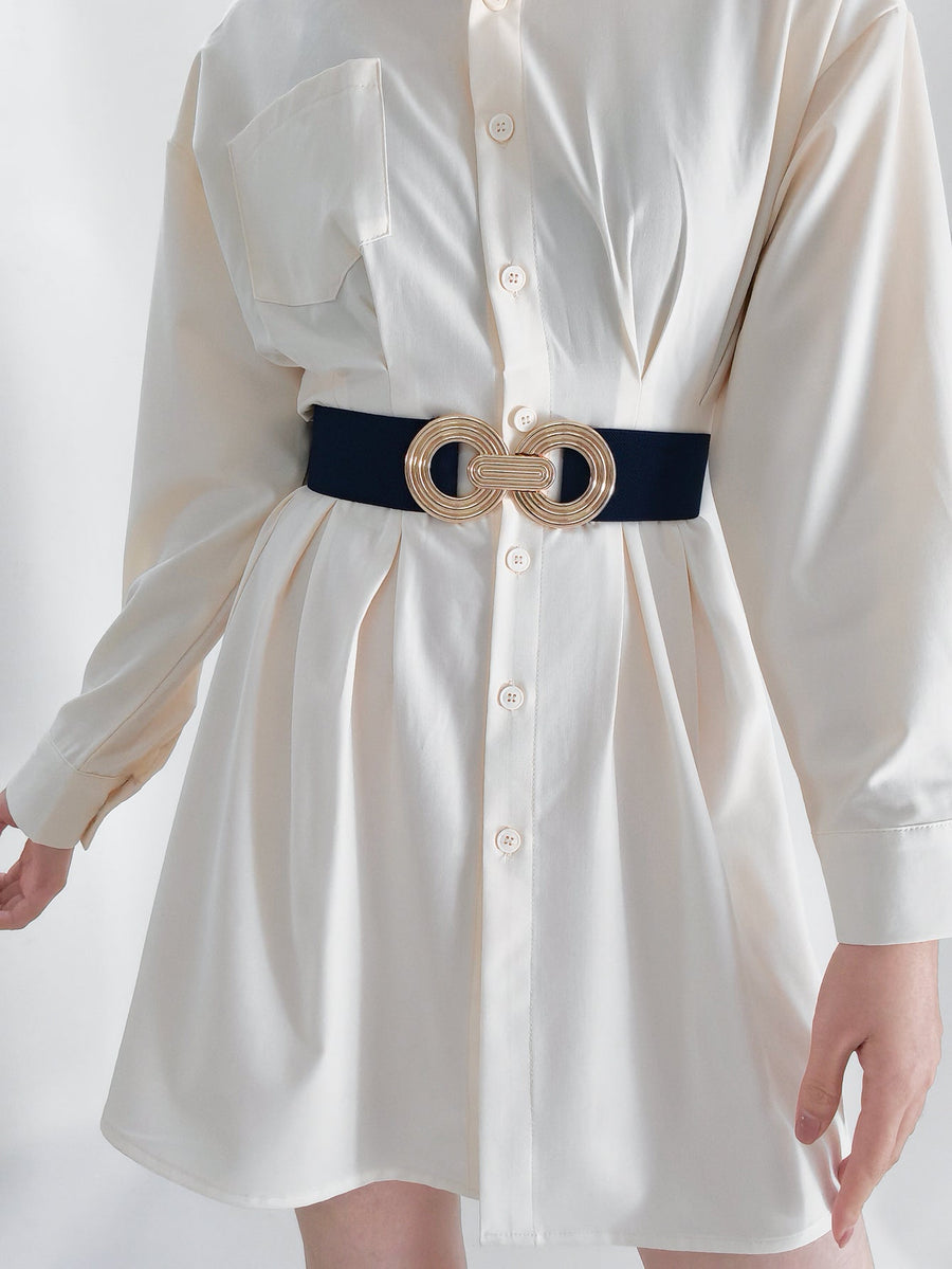 Interlocking Circle Stretch Belt in black with gold interlocking buckle detail.
