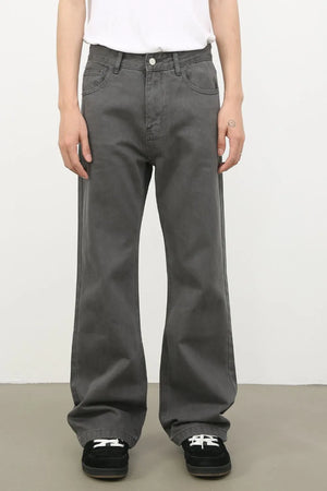 Dark gray washed denim wide-leg trousers with a relaxed fit.