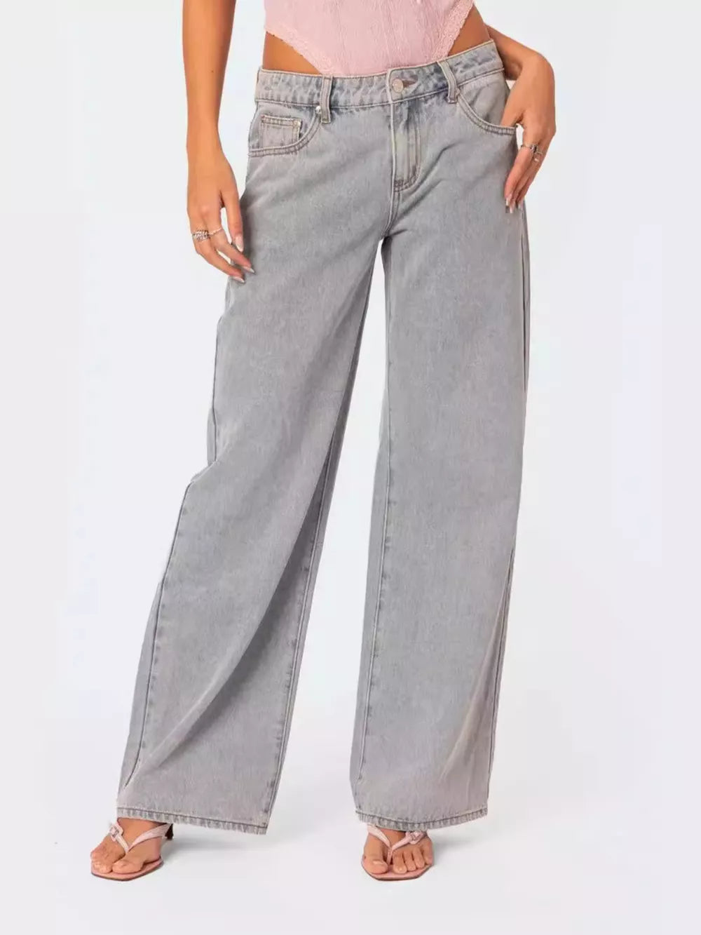 Light wash denim high-waisted relaxed fit jeans with button fly and wide leg