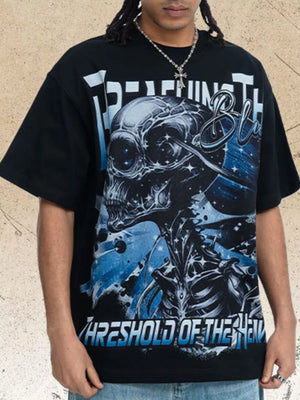 Black graphic t-shirt with bold skull and space design.